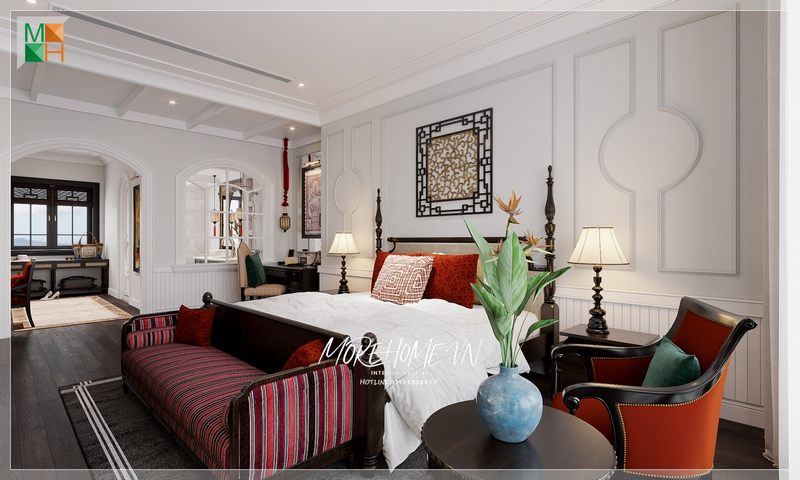 Phòng ngủ được thiết kế theo phong cách Indochine với màu đỏ nỉ Bỉ kết hợp với nội thất gỗ tự nhiên màu đen gây cảm giác sang trọng.